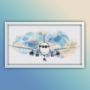 May include: A white airplane flying through a blue and yellow watercolor sky. The airplane is facing the viewer and has its landing gear down.