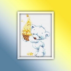 May include: A white teddy bear holding a basket of yellow stars. The bear is standing on a white background with a yellow glow around it.