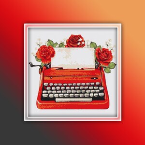 May include: A red vintage typewriter with a blank sheet of paper in the carriage. The typewriter is surrounded by red roses and white flowers.