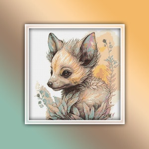 May include: A watercolour painting of a small, light brown chihuahua puppy with large ears and brown eyes. The puppy is surrounded by soft, pastel-coloured flowers and leaves.