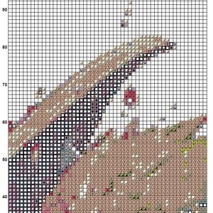 May include: A cross stitch pattern for a dragon with a black, white, gray, brown, red, and pink color scheme. The pattern is on a grid with numbers and letters for reference. The pattern is for a cross stitch project.