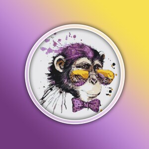 May include: A close-up of a chimpanzee wearing yellow sunglasses and a purple bow tie. The chimpanzee is surrounded by watercolor-style paint splatters.