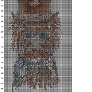 Puede incluir: Patr&oacute;n de punto de cruz de un Yorkshire Terrier con un sombrero marr&oacute;n. El patr&oacute;n est&aacute; en una cuadr&iacute;cula blanca con l&iacute;neas negras. El perro es marr&oacute;n, negro y blanco.