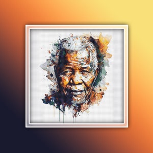 May include: A framed watercolor portrait of Nelson Mandela. The artwork features a colorful, abstract style with shades of orange, brown, and blue. The portrait is set against a white background and framed in a white border.