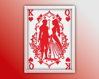 May include: A red and white playing card with a king and queen silhouette in a heart-shaped frame. The card says "K" and "Q" in the corners.