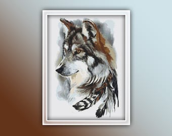May include: A close-up of a wolf's head with a gray and brown fur pattern. The wolf is looking to the side and has a few feathers around its neck.