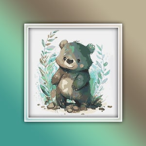 May include: A cross-stitch pattern featuring a charming bear cub. The bear is depicted in shades of green and brown, surrounded by light green and brown foliage. The artwork is framed in a white square.