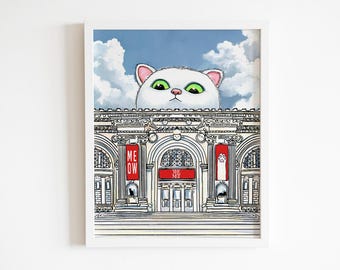 Peut inclure: Impression artistique encadrée représentant un chat blanc regardant par-dessus un bâtiment. Le bâtiment affiche "THE MET" et "ME OW" sur des bannières. Le chat a des yeux verts et des oreilles roses, sur fond de ciel bleu nuageux.