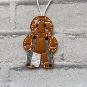 Broken leg | crutches|  gingerbread hanging decoration