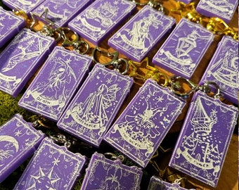 Mini porte-clés mauves et blancs pour cartes de tarot