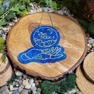 Blue and Faux Gold Flake &#39;Let&#39;s Seek&#39; Crystal Ball Wall Hanging