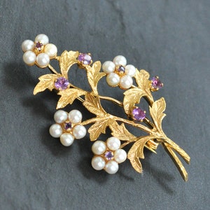 Broche met amethist en parel