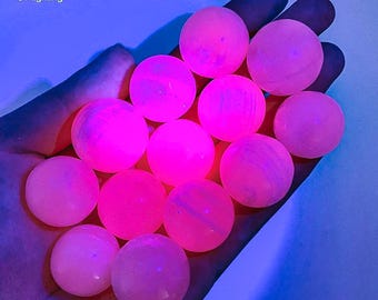 Mangano Calcite Sphere | UV reactive crystal ball, pink fluorescent polished orb