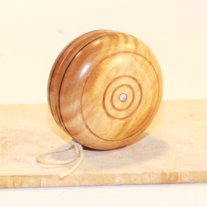 Curly Maple Yo-Yo with Cubic Zirconia and Burn-Line Accents