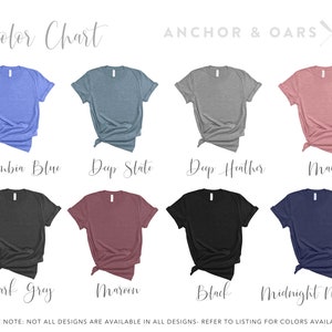 May include: Color chart showing 10 different t-shirt colors: Columbia Blue, Deep State, Deep Heather, Mauve, Dark Gray, Maroon, Black, Midnight Navy.  "Anchor & Oars" is written in white text with a crossed oar and anchor graphic.