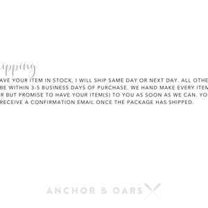 May include: Text on a white background that reads "Shipping" followed by a paragraph about shipping policies. The text at the bottom reads "ANCHOR & OARS" with a crossed oar graphic.