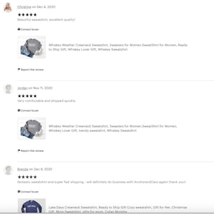 May include: Three customer reviews for a gray sweatshirt with the text "Whiskey Weather Crewneck Sweatshirt" and a gray sweatshirt with the text "Lake Days Crewneck Sweatshirt".