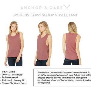 May include: A maroon scoop neck muscle tank with a low cut armhole, side seams, a relaxed fit, and a curved bottom hem. The tank is made of a soft, drapey fabric. "The Bella + Canvas 8803 women's muscle tank is stylishly designed with a soft poly fabric that softly drapes around curves. The modern, elongated armholes and curved bottom hem makes it perfect for layering."