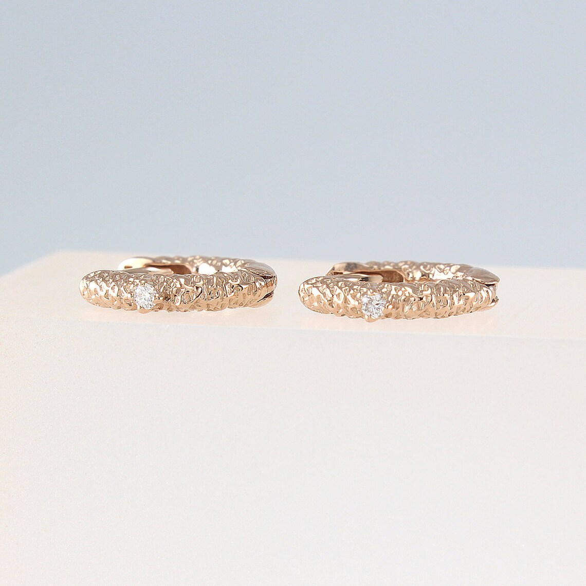 Small Oval Graduated Diamond Huggie Hoops - PAIR main image 0