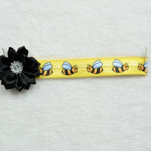 Bumblebee print headbands. Fit 8.5/ 9"  and 10.4/ 11"heads.Reborn dolls, silicone dolls, baby dolls etc.  Salia, Addie. No dolls included.