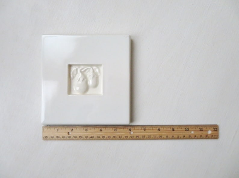 minimalist white kitchen decor white tile trivet with eggplants ceramic hot pad Pull Cart Tile vintage 90s