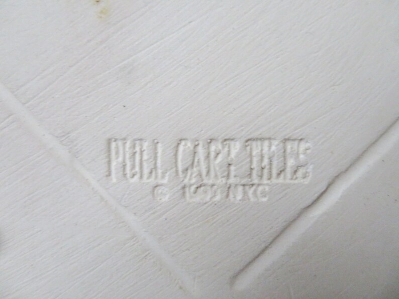 minimalist white kitchen decor white tile trivet with eggplants ceramic hot pad Pull Cart Tile vintage 90s