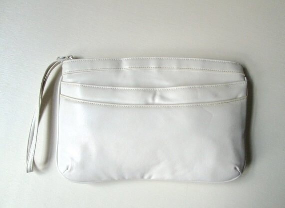 white clutch bag with wrist strap