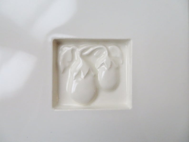 minimalist white kitchen decor white tile trivet with eggplants ceramic hot pad Pull Cart Tile vintage 90s