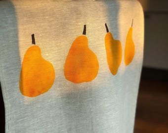 Torchon en lin imprimé poires d'été jaune doré.