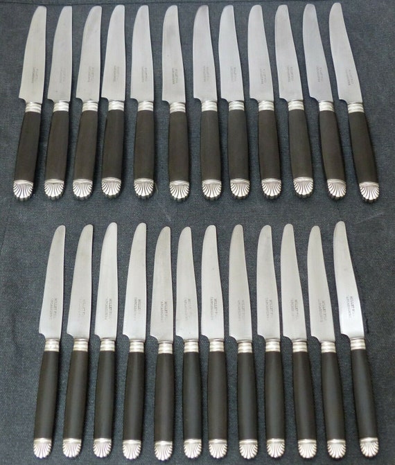 Antique French set of 24 sterling silver knives with collar, table and dessert handles, ebony handles, 19th century