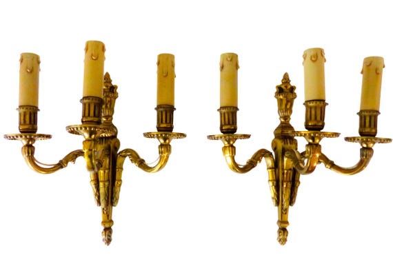 Gorgeous antique French bronze pair, circa 1930, wall light sconce with triple arms, Louis XVI style.