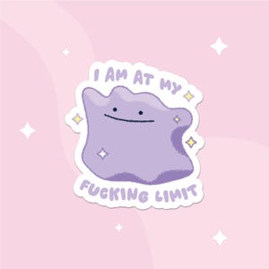 May include: A die-cut sticker featuring a purple, amorphous, blob-like character with a simple face consisting of two dots and a line. The text "I AM AT MY FUCKING LIMIT" is printed in purple letters above and below the character, accented by small yellow stars.
