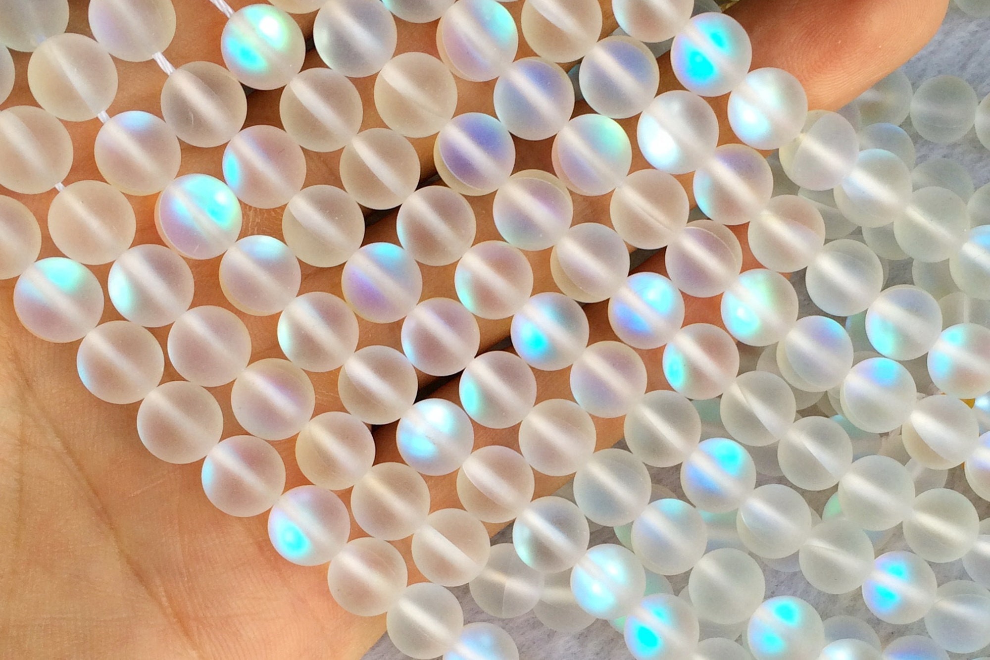 6mm/8mm/10mm Rainbow Synthetic Moonstone round beads – GemWholesales