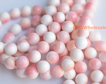 18 cuentas redondas de concha de reina rosa rubor AA de 10-11 mm, ideales para joyería. Cuentas redondas de concha de reina rosa natural.