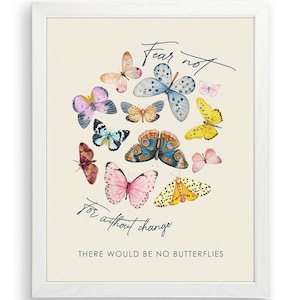 May include: A white framed print with a beige background featuring a circle of colorful butterflies and the text "Fear not, for without change there would be no butterflies".