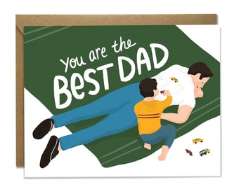 Sweet Father's Day Card - Young child playing cars on dad