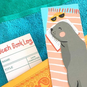 Strandbuch Seelöwe Lesezeichen - doppelseitig mit Vintage Leselog auf der Rückseite