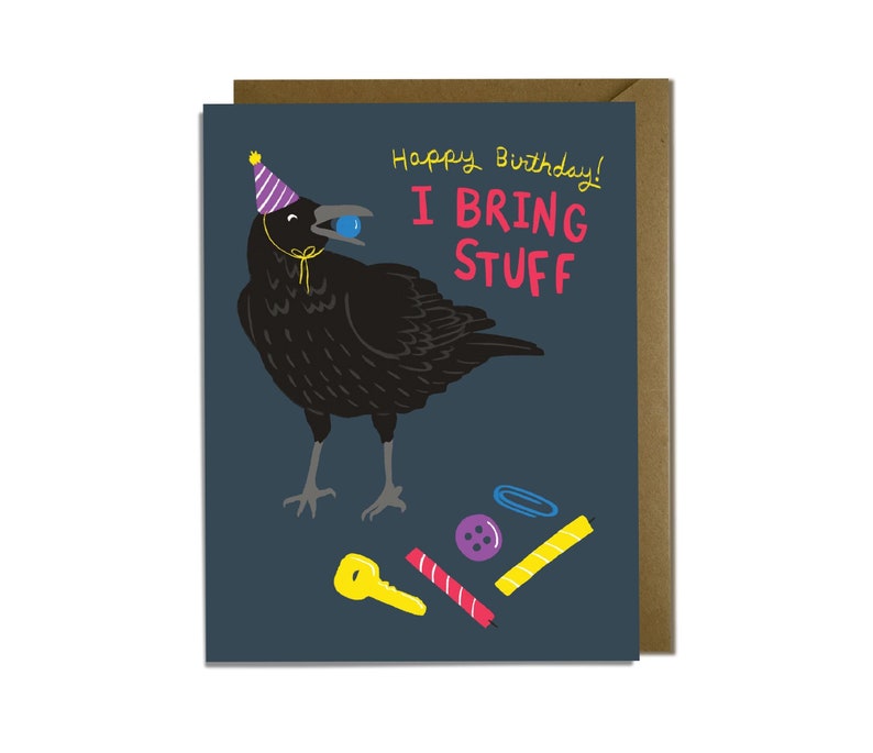 Funny illustrated crow with birthday hat on and marble in it's beak. Lots of crow tokens laying on ground around it such as key, candles, button and paper clip. Phrase "Happy birthday! I bring stuff" against dark blue background.