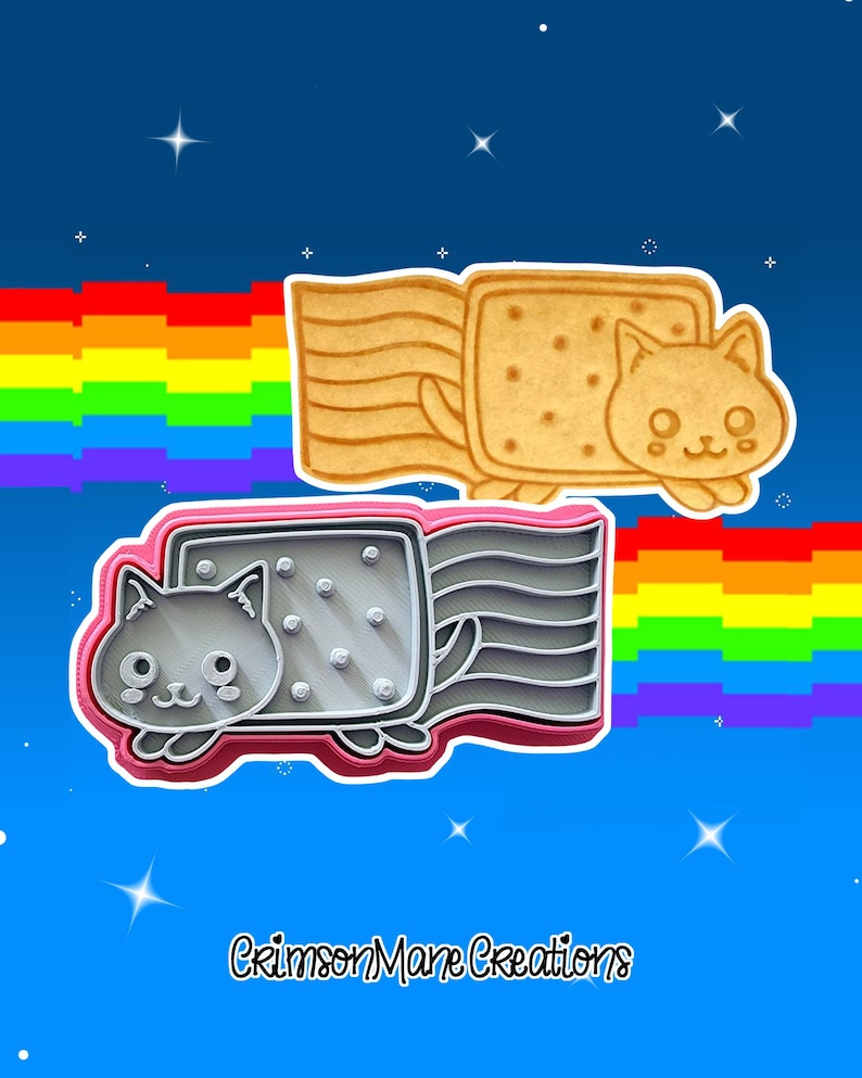 May include: Two cookie cutters in the shape of a Nyan Cat, one tan and one gray, with a rainbow and a blue background. The tan cutter is a cookie with a cat face and a pop-tart body. The gray cutter has a pink outline.