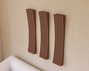 May include: Three wooden wall panels with a curved design, arranged vertically on a beige wall. The panels are a light brown color and have a natural wood grain finish.