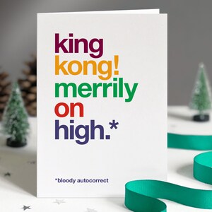 Grappige autocorrectie King Kong kerstkaart
