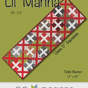 May include: A quilted table runner with a patchwork design. The runner is 15 inches wide and 45 inches long. It features a pattern of red crosses and various patterned squares. The text "Lil' Marina" and "Uses 5" Squares" are visible.