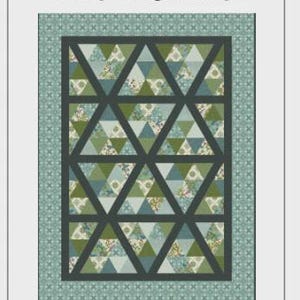 May include: A Striplogy Ruler Pattern titled Kite Runner by GE Designs. The cover features a quilt design with a geometric pattern of triangles in shades of green, blue, and white, surrounded by a patterned border. The text 3 SIZES is visible.