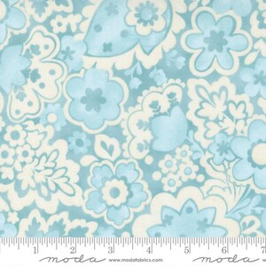 May include: A blue and white floral fabric with a paisley-like pattern. The fabric features a variety of flower shapes and sizes, all in shades of blue and white.