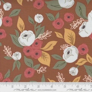 May include: A brown fabric with a white and pink floral pattern. The fabric features a repeating pattern of white flowers with pink centers and yellow leaves.