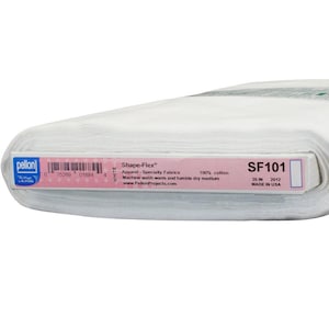 May include: White cotton fabric roll labeled "Shape-Flex™ Apparel-Specialty Fabrics" with product code "SF101", size "20 IN", and "MADE IN USA".