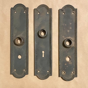 Set of Three Antique Cast Iron Door Knob Plates