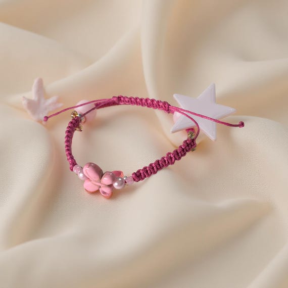 Braided bracelet wove style made of leather cord, beads and a ceramic butterfly. Provided on different beautiful colors for anyone likes.