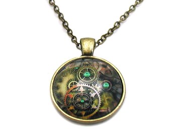 May include: A bronze chain necklace with a round pendant featuring a steampunk design of gears and cogs with green accents.