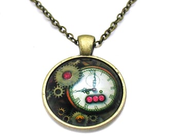 May include: A bronze chain necklace with a round pendant featuring a clock face with gears and red accents.